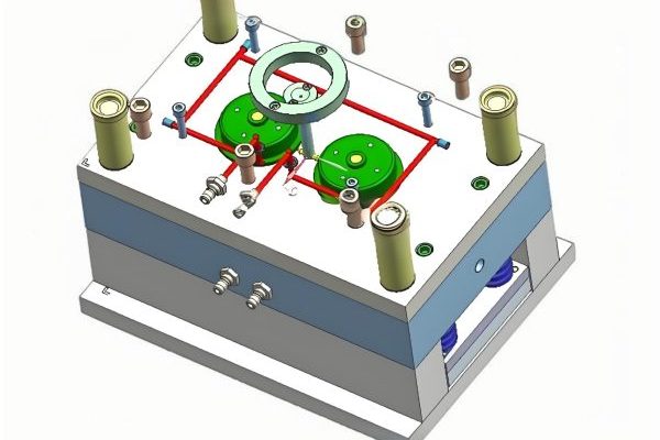 Designer comparing updated plastic part specifications with existing 3D mold design