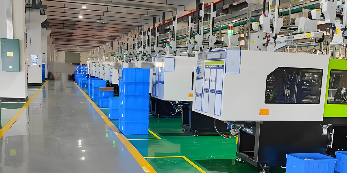 Mold manufacturing process showing workers monitoring production equipment