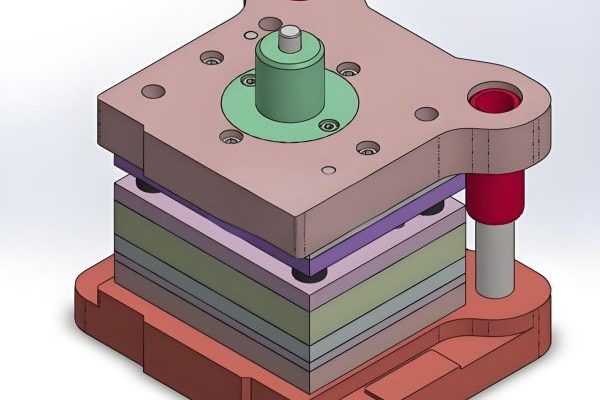 Designer working on 3D mold model using computer-aided design software